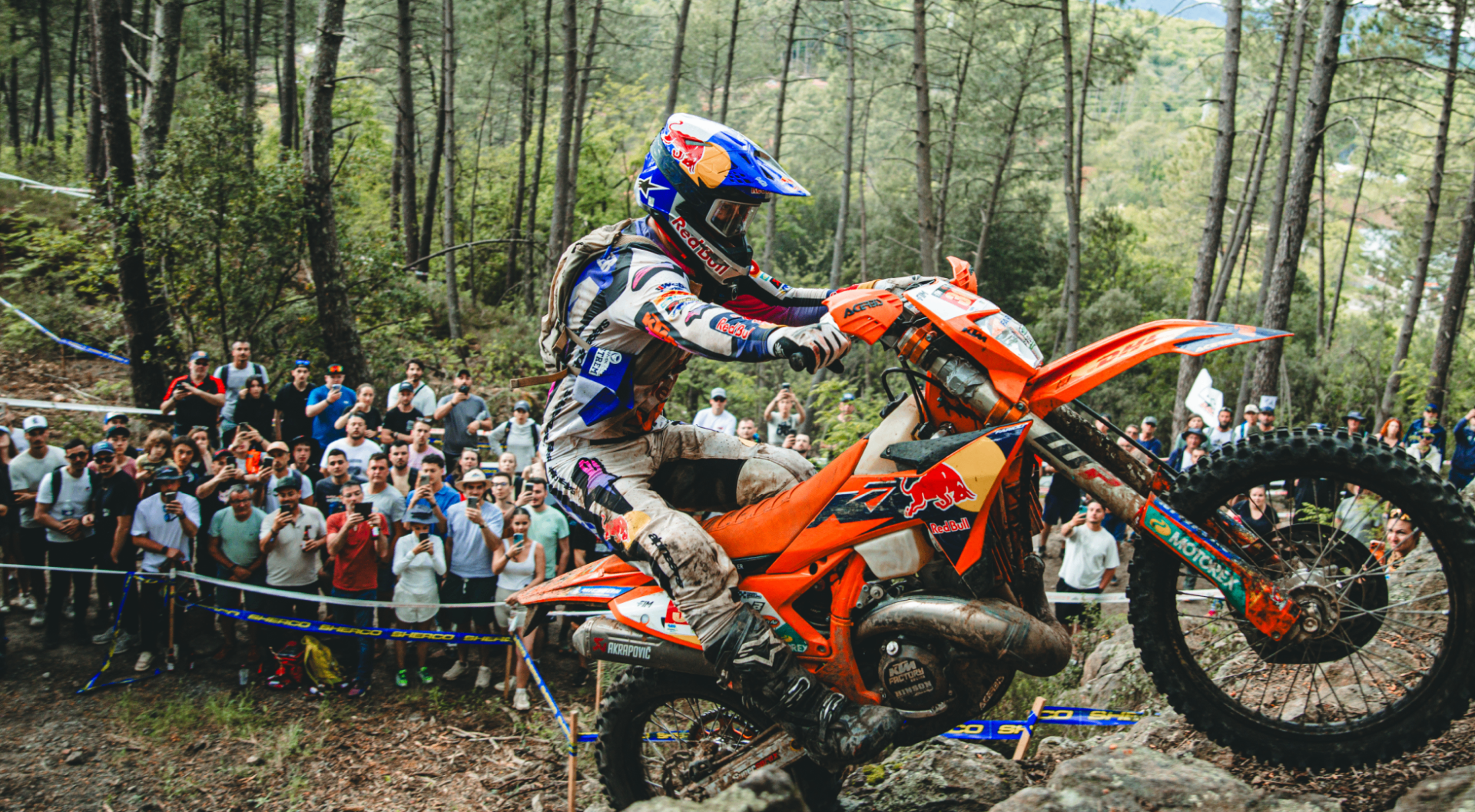Hard enduro rider on a mountain face