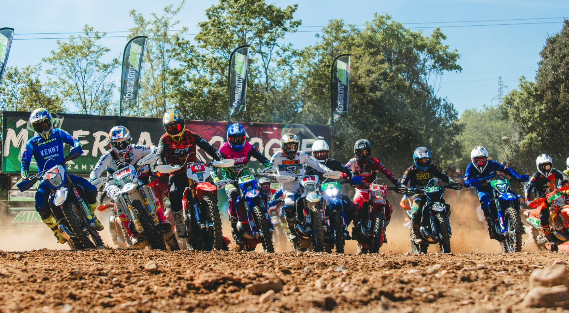 Hard Enduro World Championship riders launching off the start line
